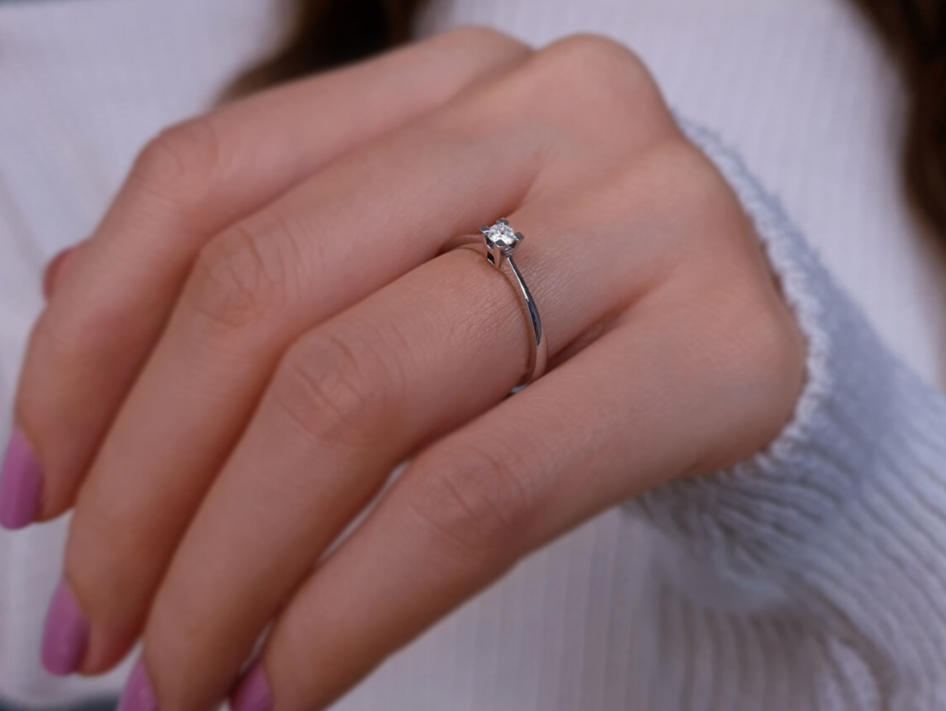 0.09 carat solitaire diamond earrings