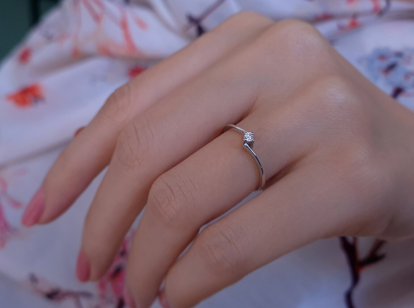 0.06 carat solitaire diamond ring