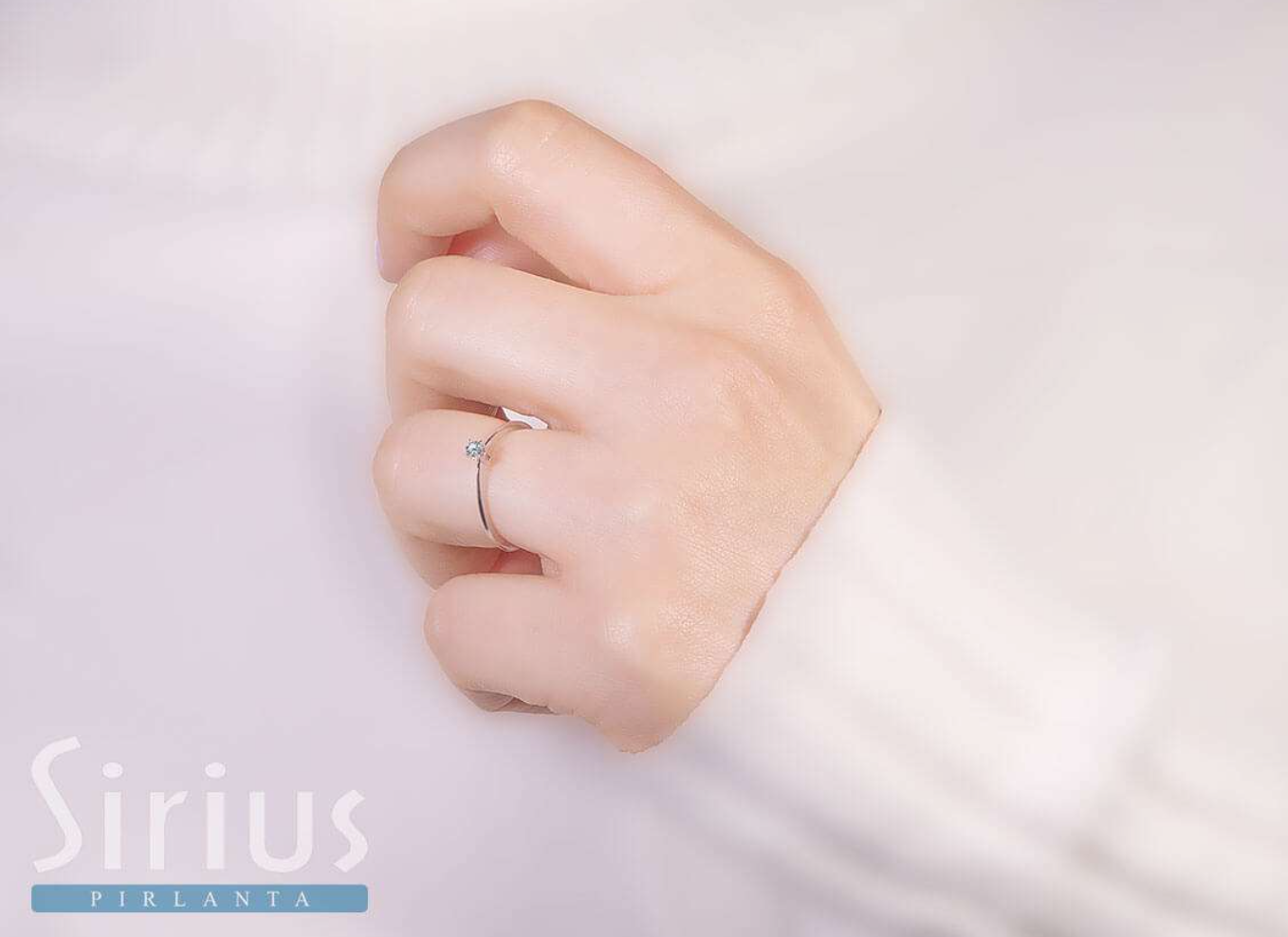 0.06 carat diamond solitaire ring