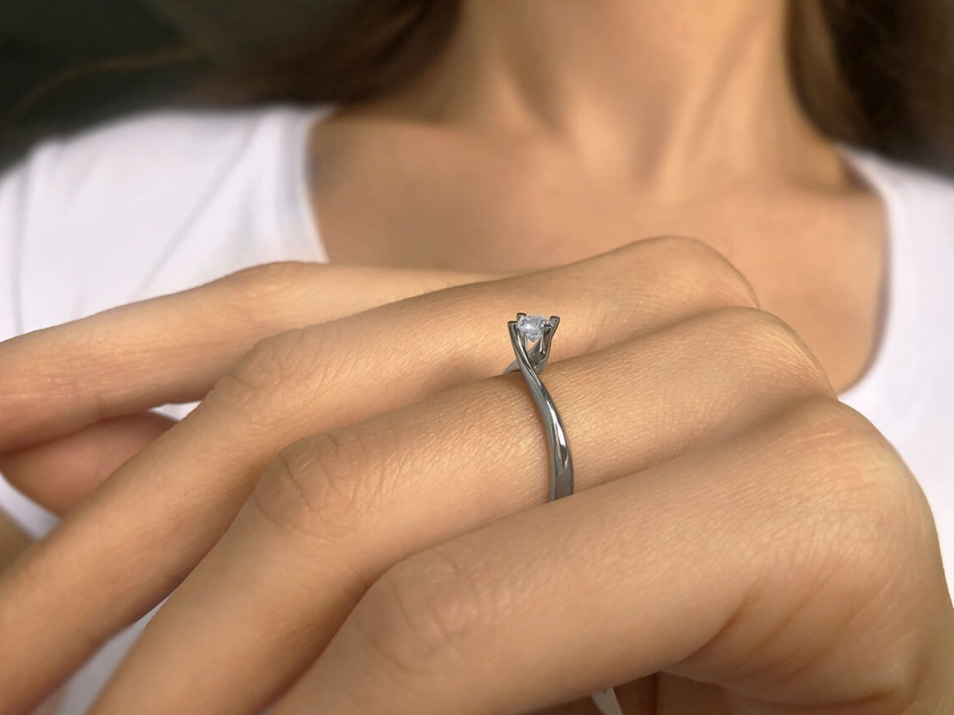 0.16 carat solitaire diamond ring