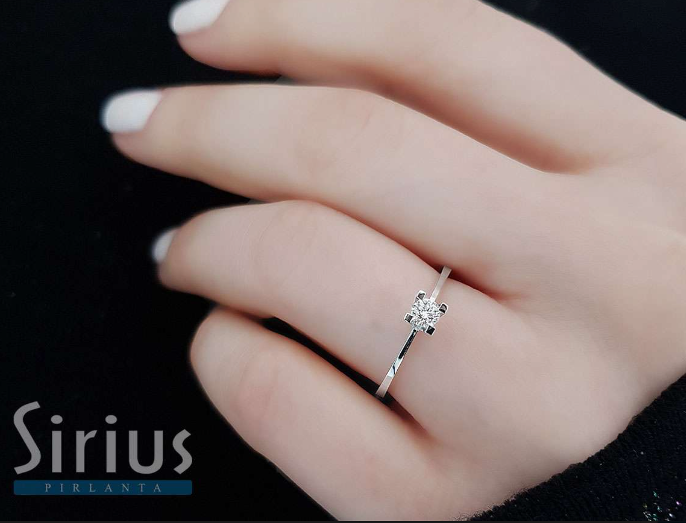 Bague solitaire diamant couleur G 0,15 carat