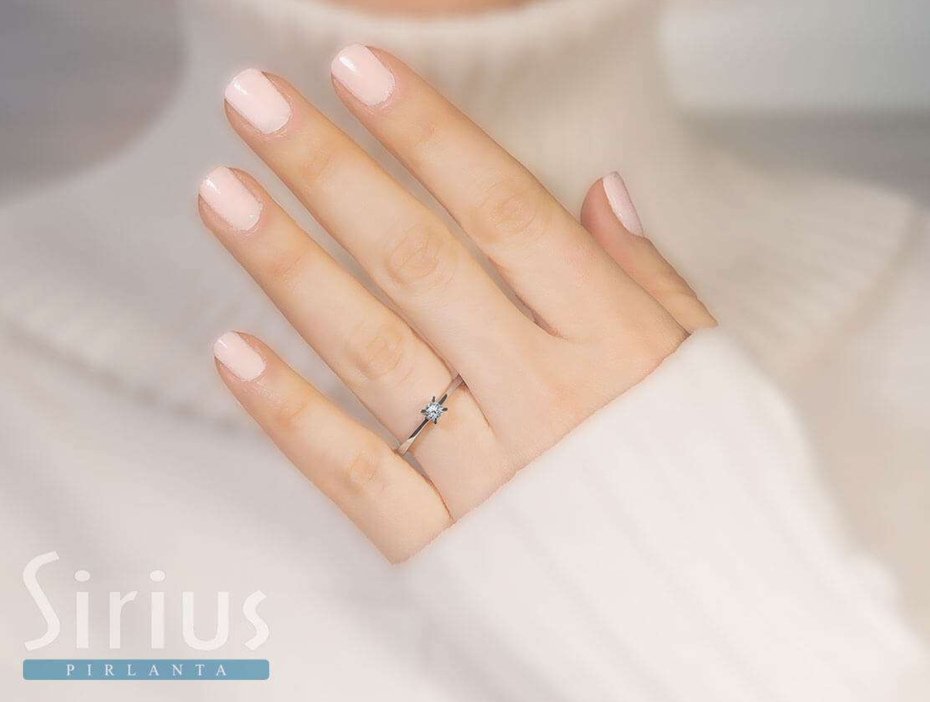 0.15 carat solitaire diamond ring