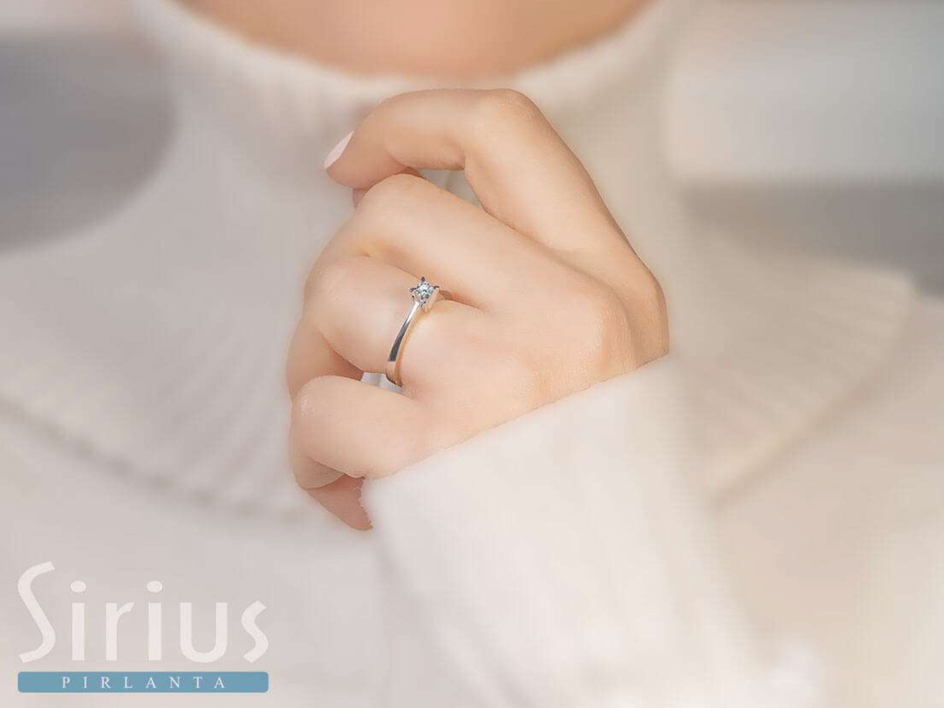 0.15 carat solitaire diamond ring