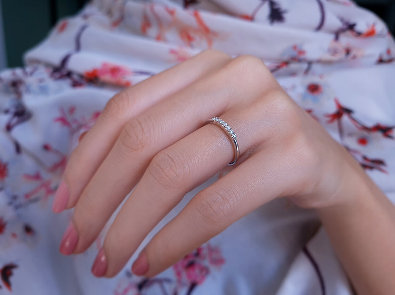 0.14 carat engagement ring with seven diamonds