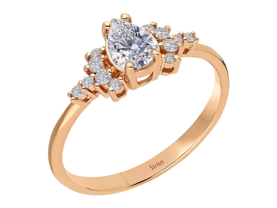 Birgie Tropfenförmiger Ring mit weißem Saphir und Diamanten