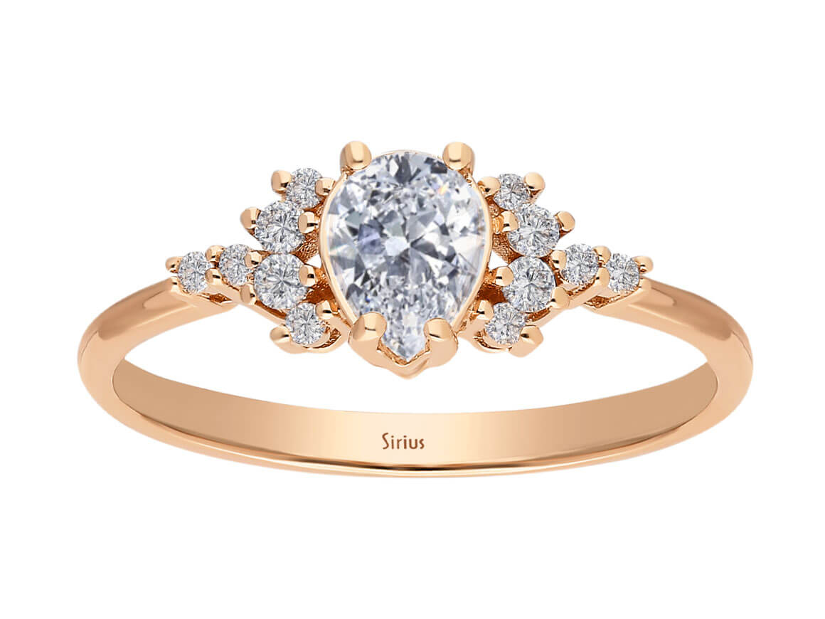 Birgie Tropfenförmiger Ring mit weißem Saphir und Diamanten