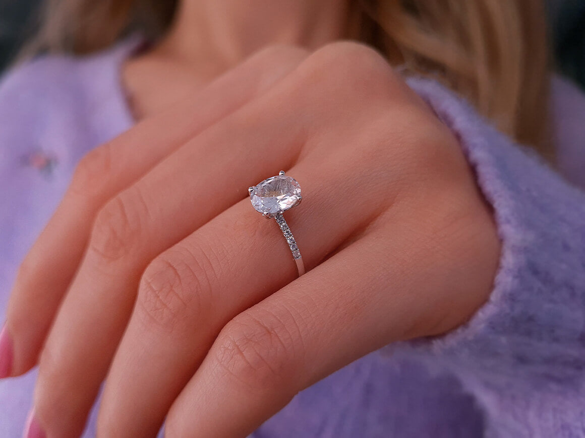 Diamond and White Topaz Ring
