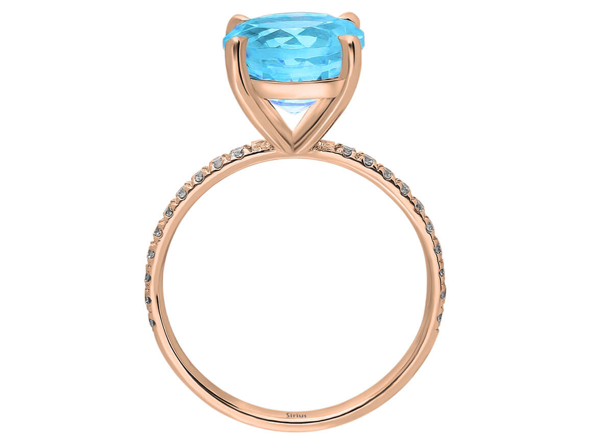Bague diamant et topaze bleue