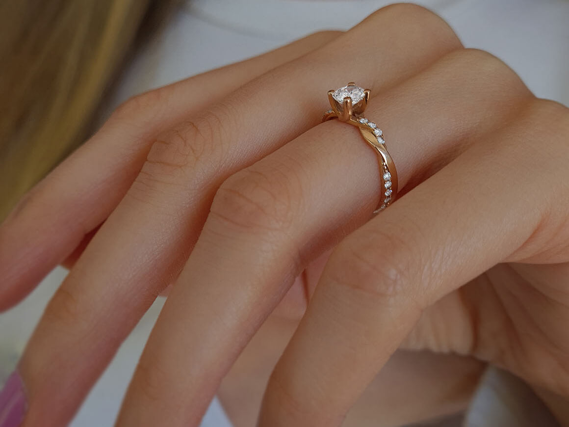 Bague solitaire diamant 0,60 carat au total