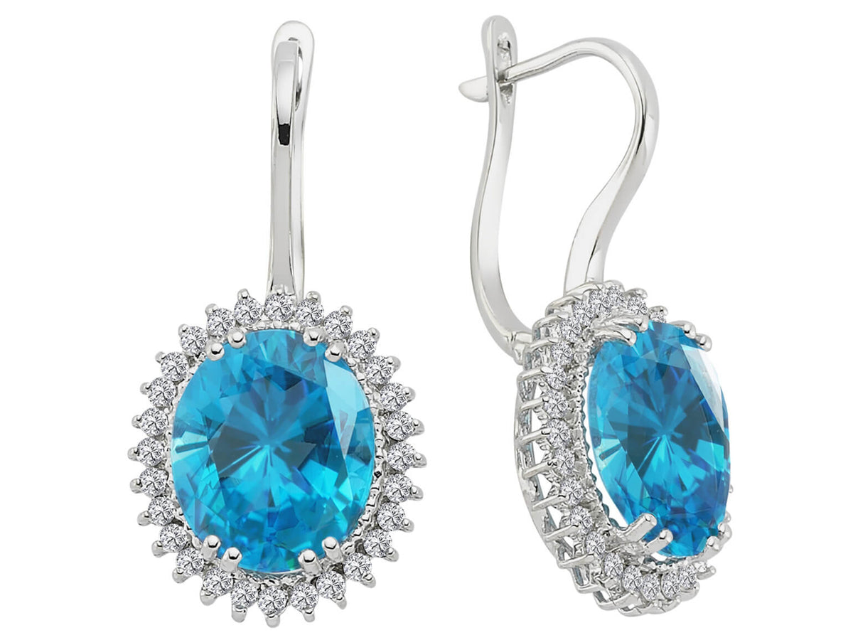 Boucles d'oreilles pendantes en diamant et topaze bleue ovale