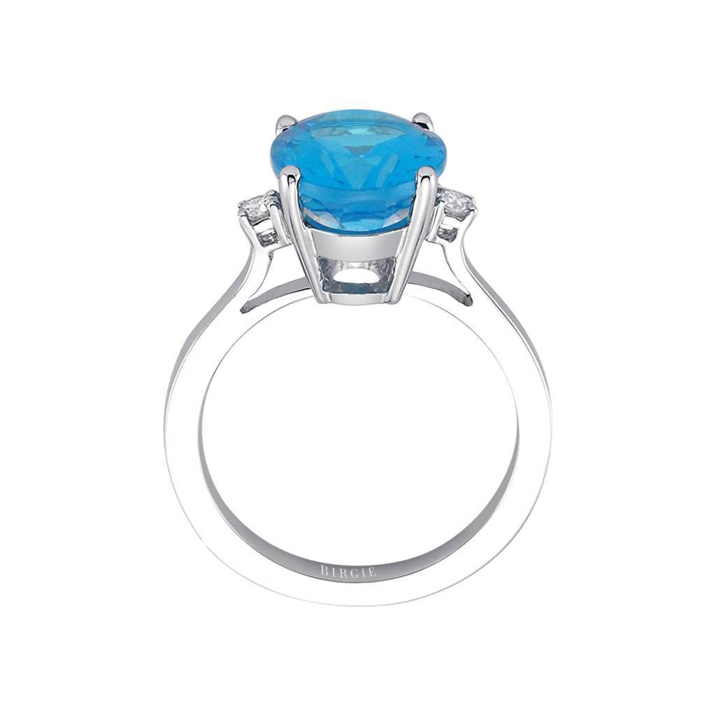 Diamond and Oval Blue Topaz Ring