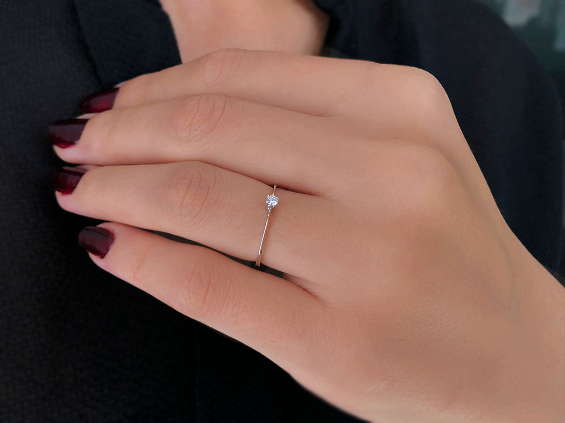 Bague solitaire diamant 0,05 carat