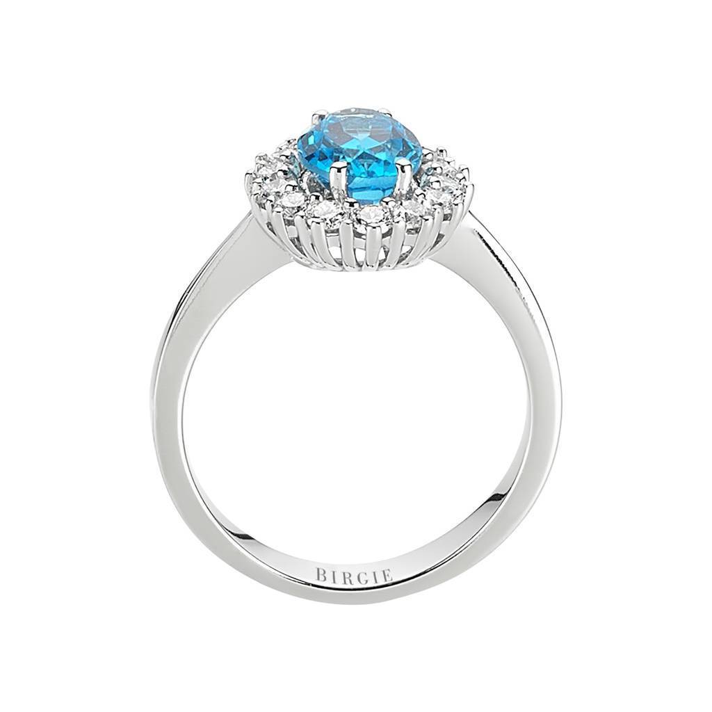 Diamond and Oval Blue Topaz Ring