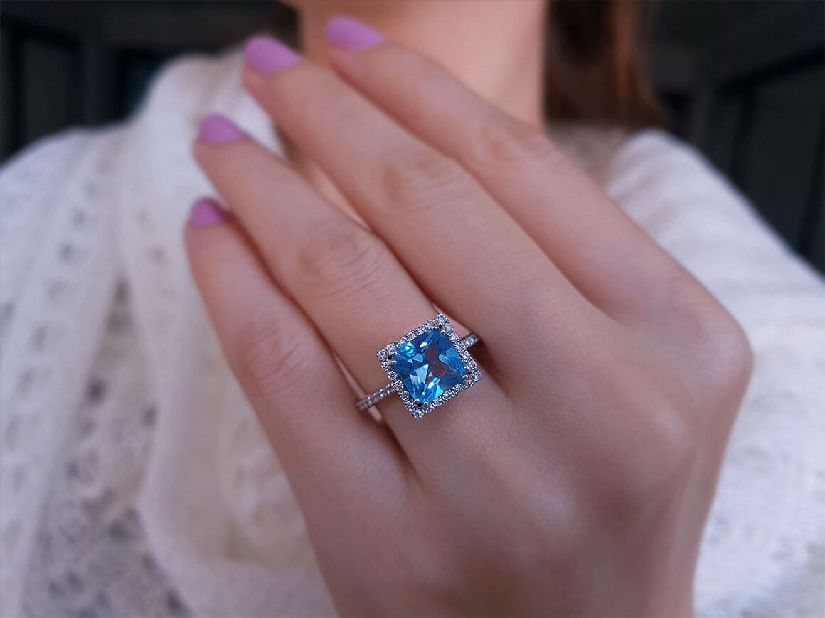 Diamond and Princess Blue Topaz Ring