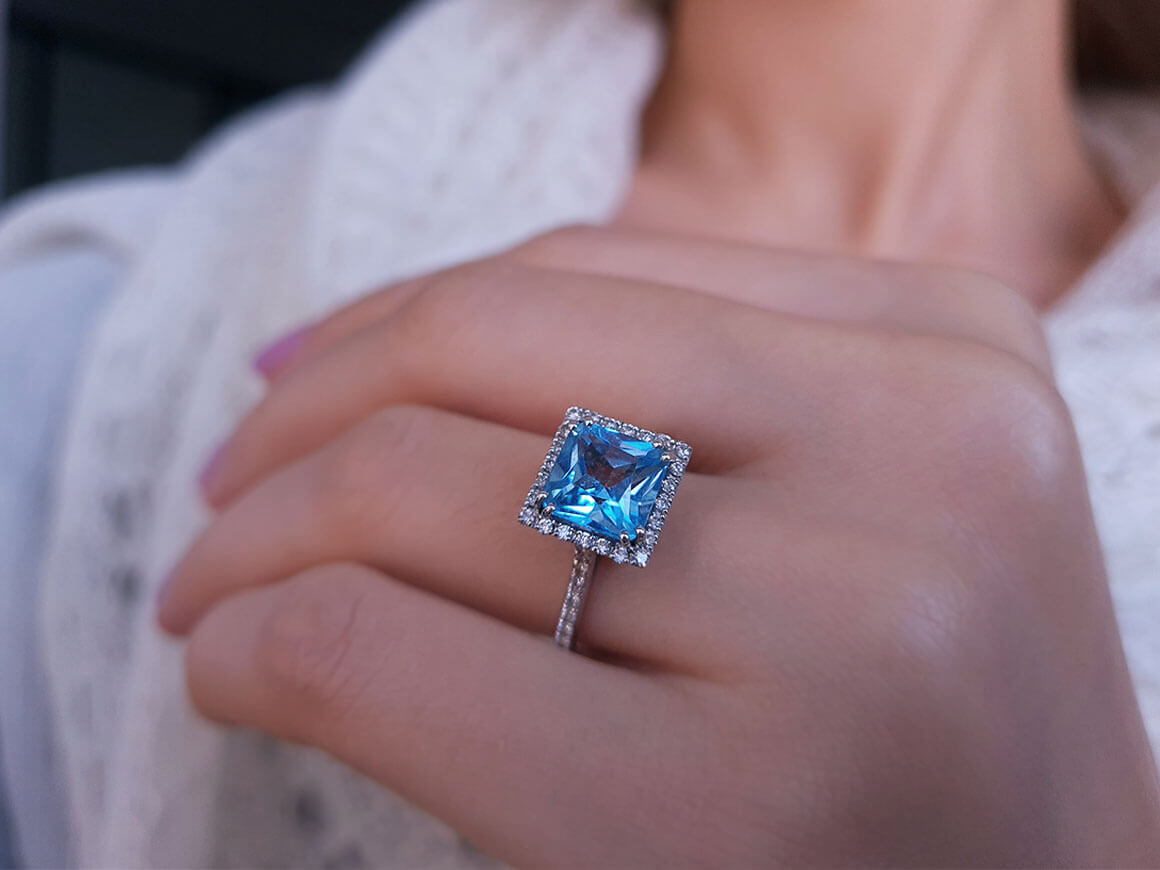 Diamond and Princess Blue Topaz Ring