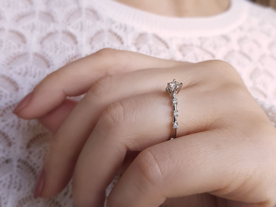 0.33 total carat diamond halo solitaire ring
