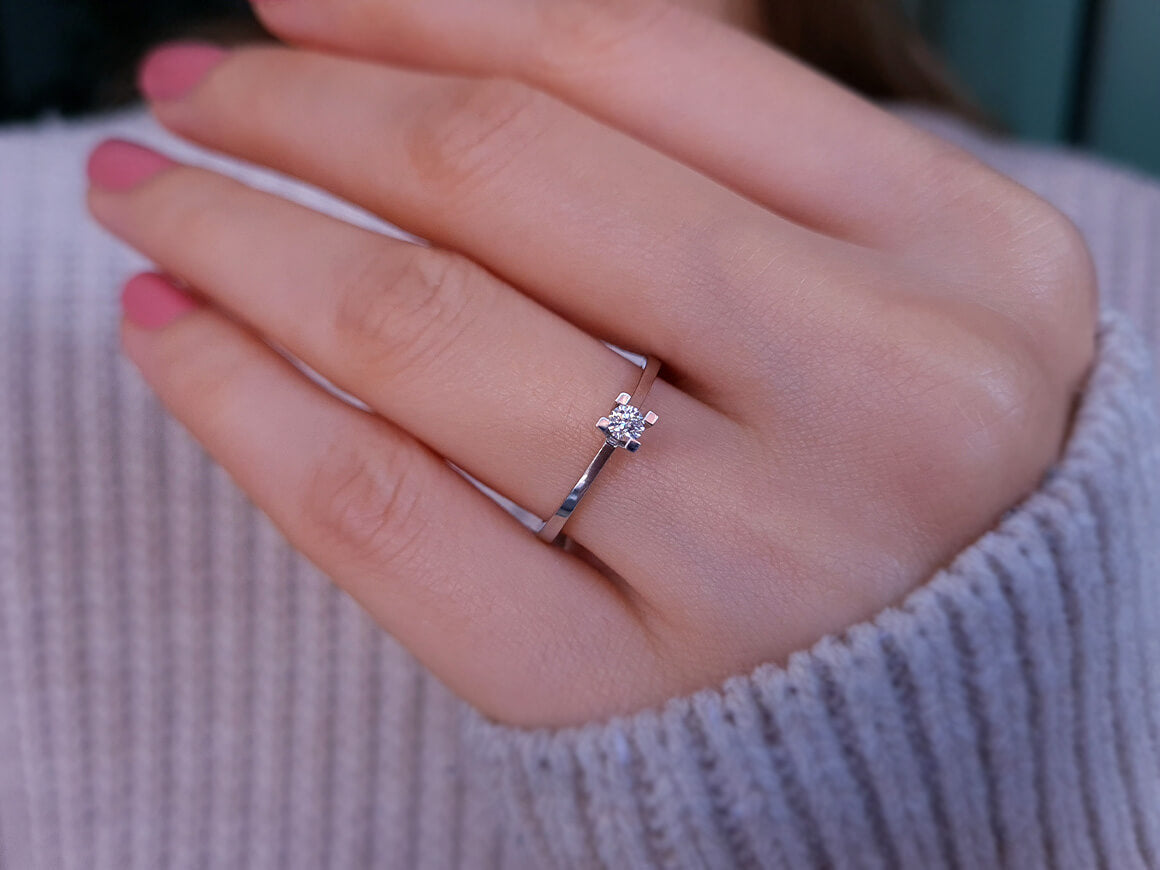0.09 carat diamond solitaire ring
