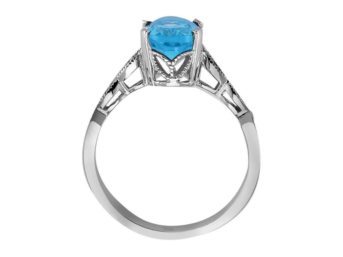Diamond and Oval Blue Topaz Ring