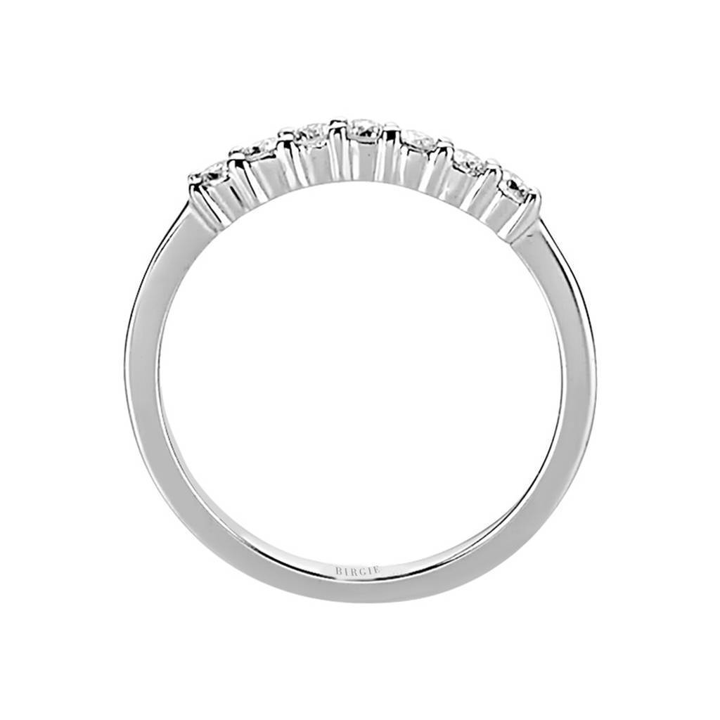 0.14 carat engagement ring with seven diamonds