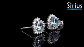 Boucles d'oreilles puces diamant et coeur topaze bleue