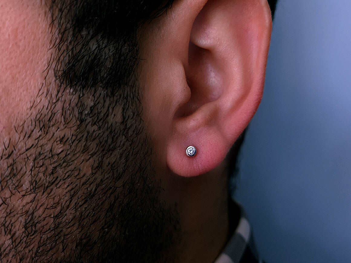 0.05 carat diamond solitaire men's stud earrings