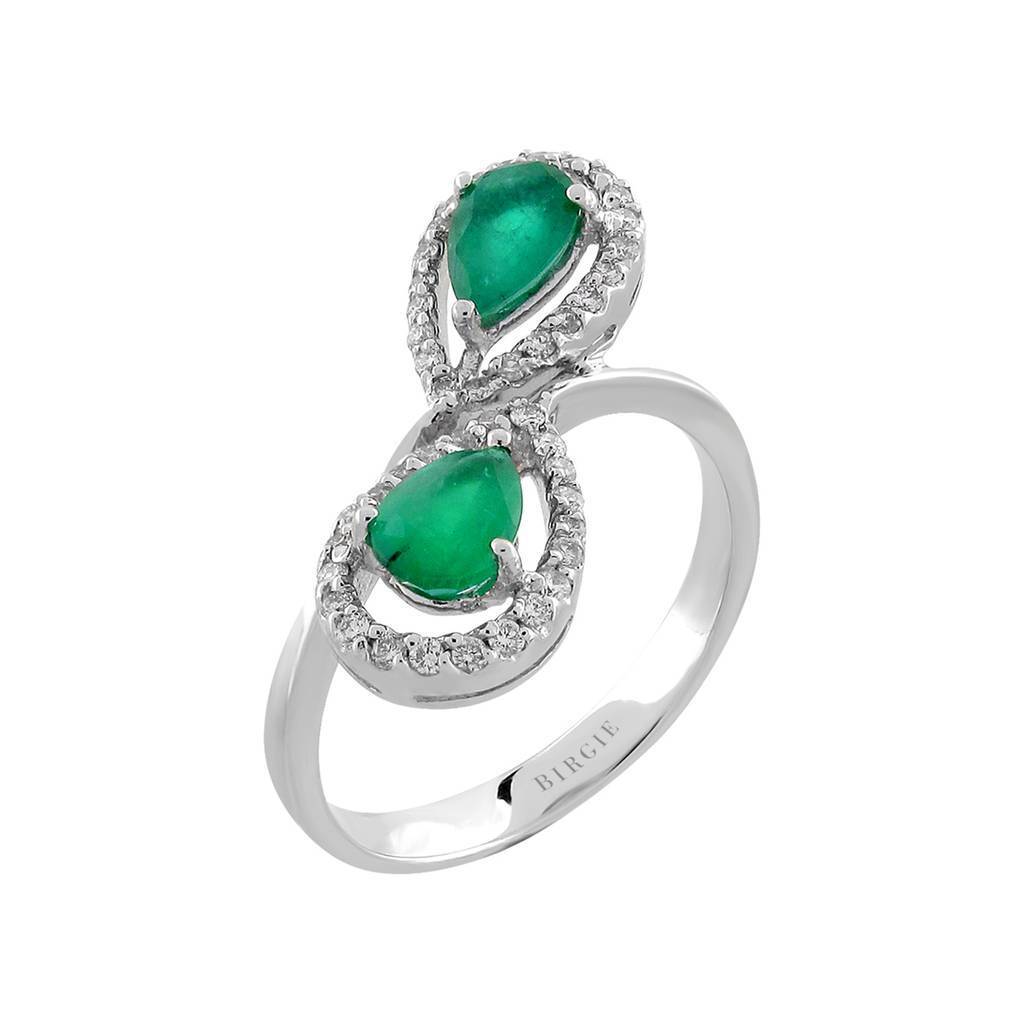 Bague émeraude en forme de goutte et griffe partagée avec pierres latérales en diamant en or 18 carats