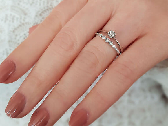 0.15 carat solitaire diamond ring