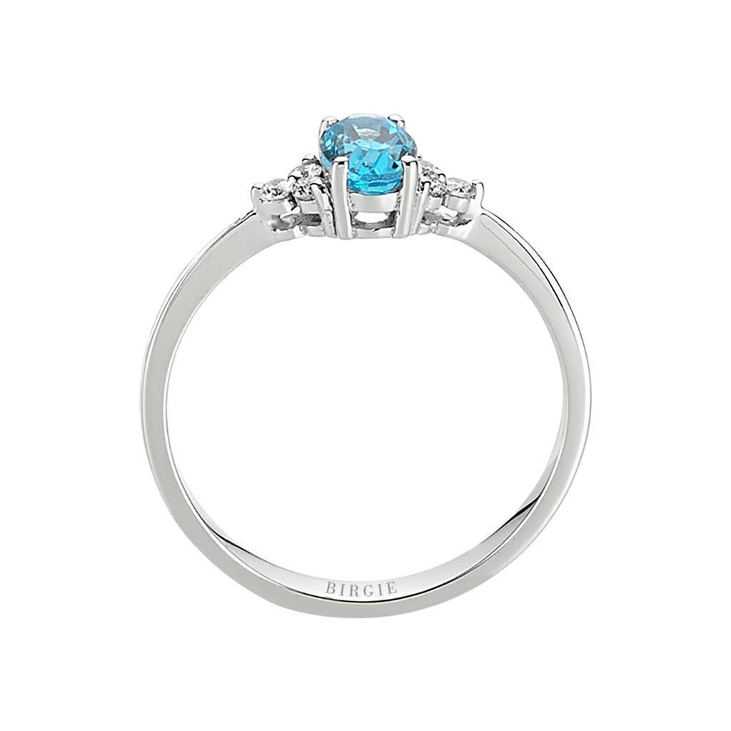 Bague diamant et topaze bleue ovale