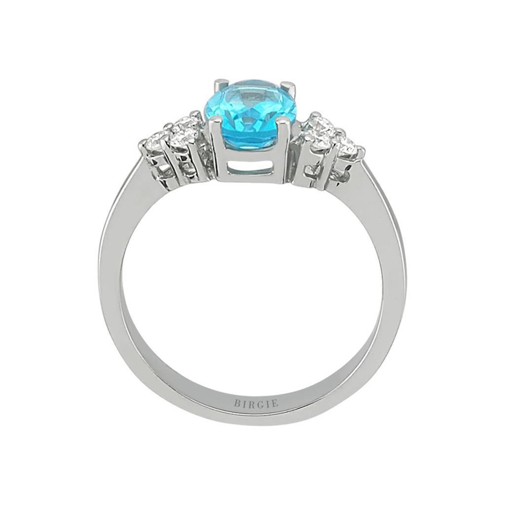 Bague diamant et topaze bleue ovale
