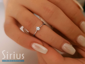 Bague solitaire diamant 0,12 carat