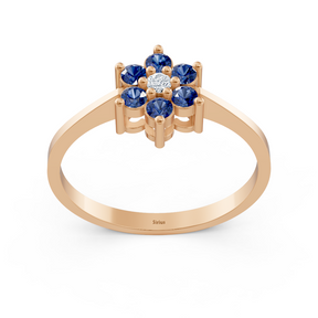 Eleganter Roségoldring mit Saphiren und Diamanten