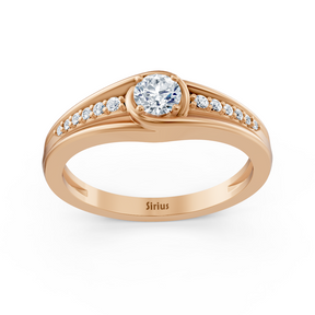 Bague en or rose avec diamants latéraux de 0,30 carat