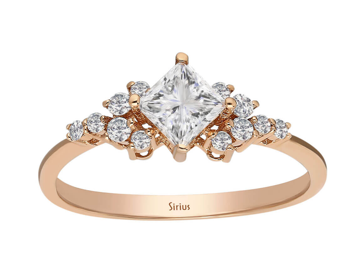 Birgie Ring mit weißem Saphir und Diamanten