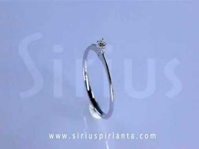 0.06 carat diamond solitaire ring