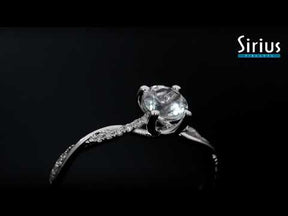 Bague diamant et topaze blanche