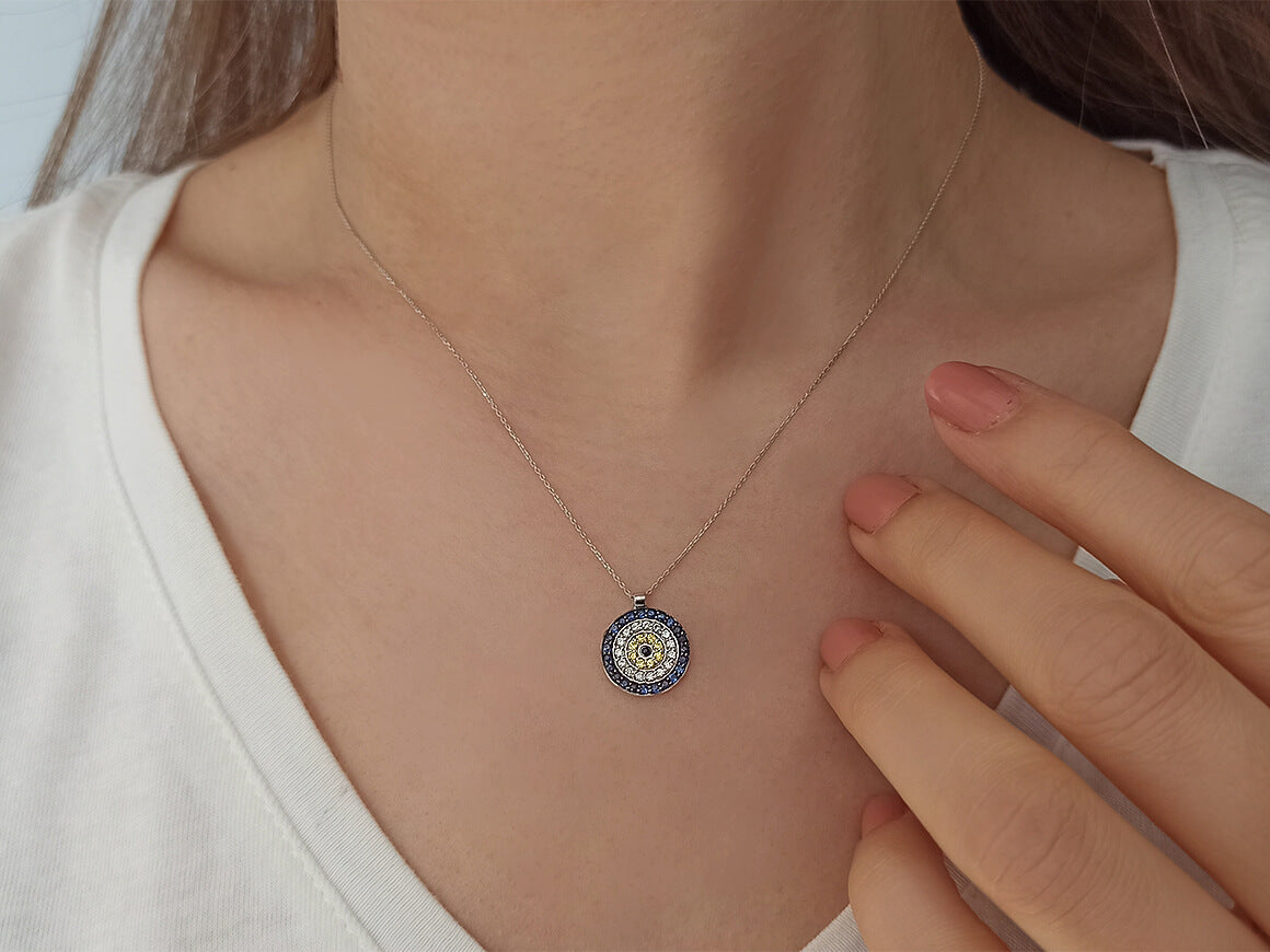 Sapphire and diamond eye necklace