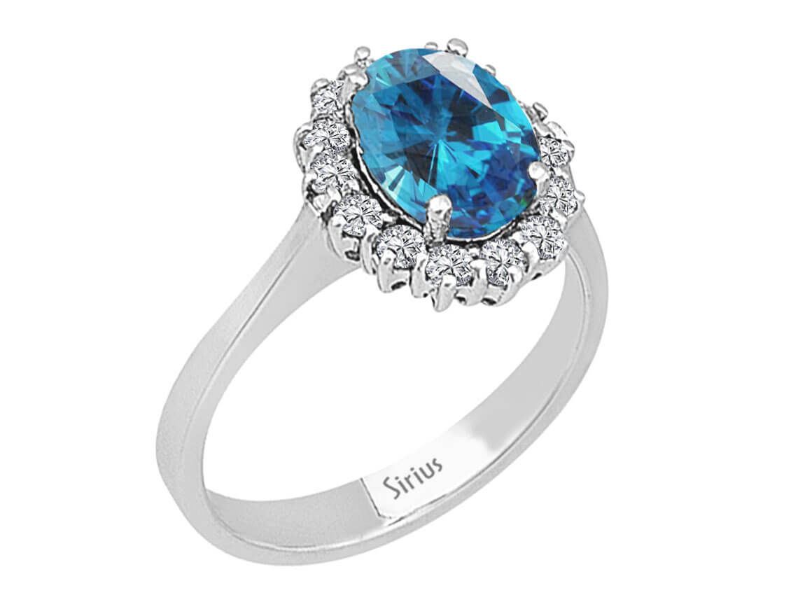 Bague diamant et topaze bleue ovale