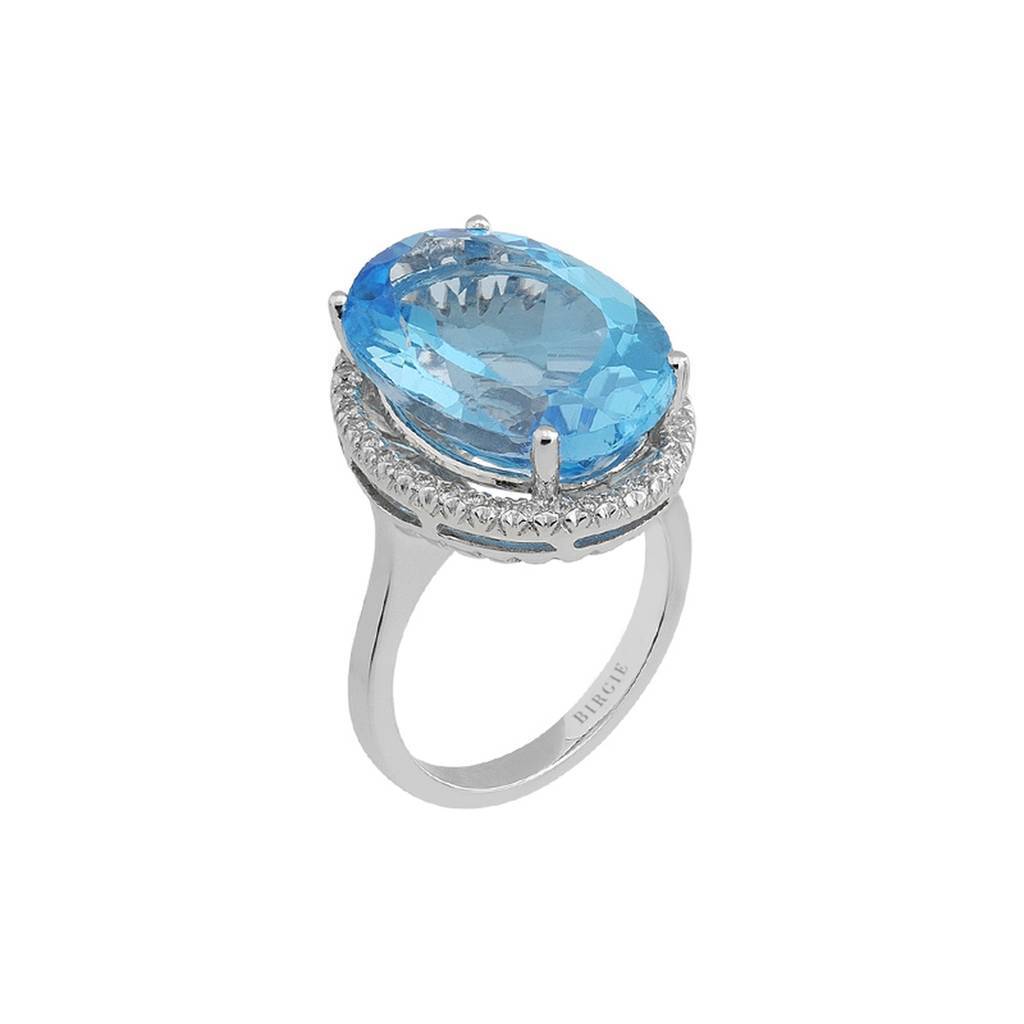 Bague diamant et topaze bleue ovale