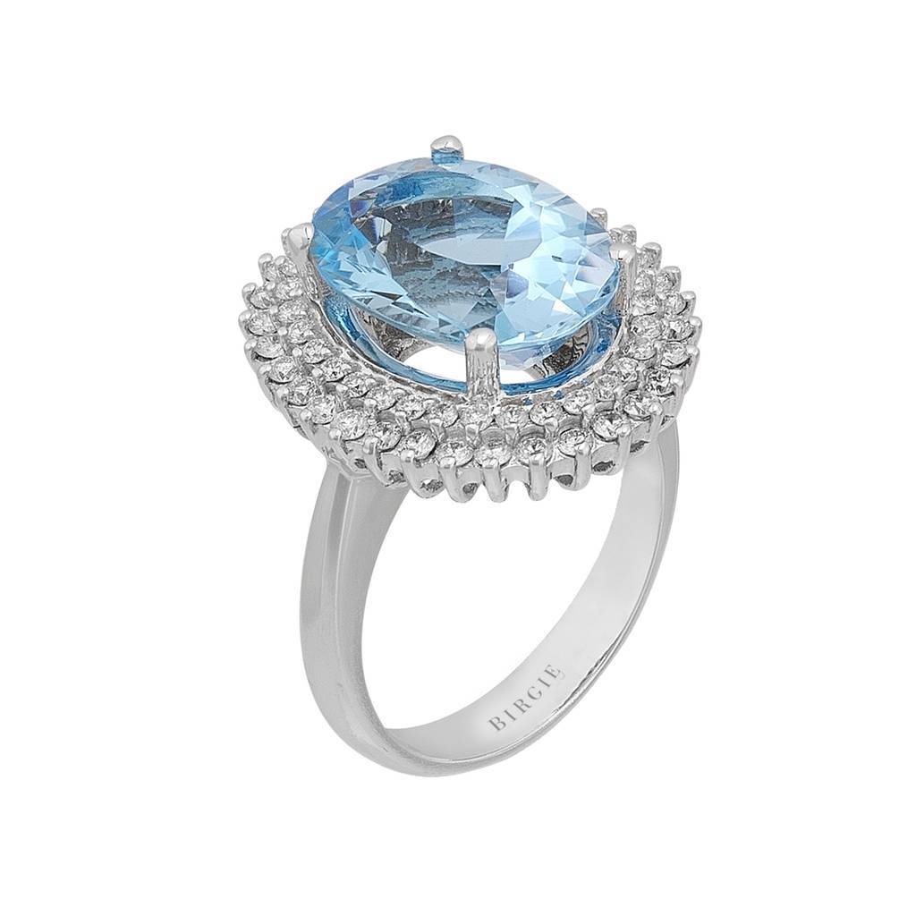 Bague diamant et topaze bleue ovale