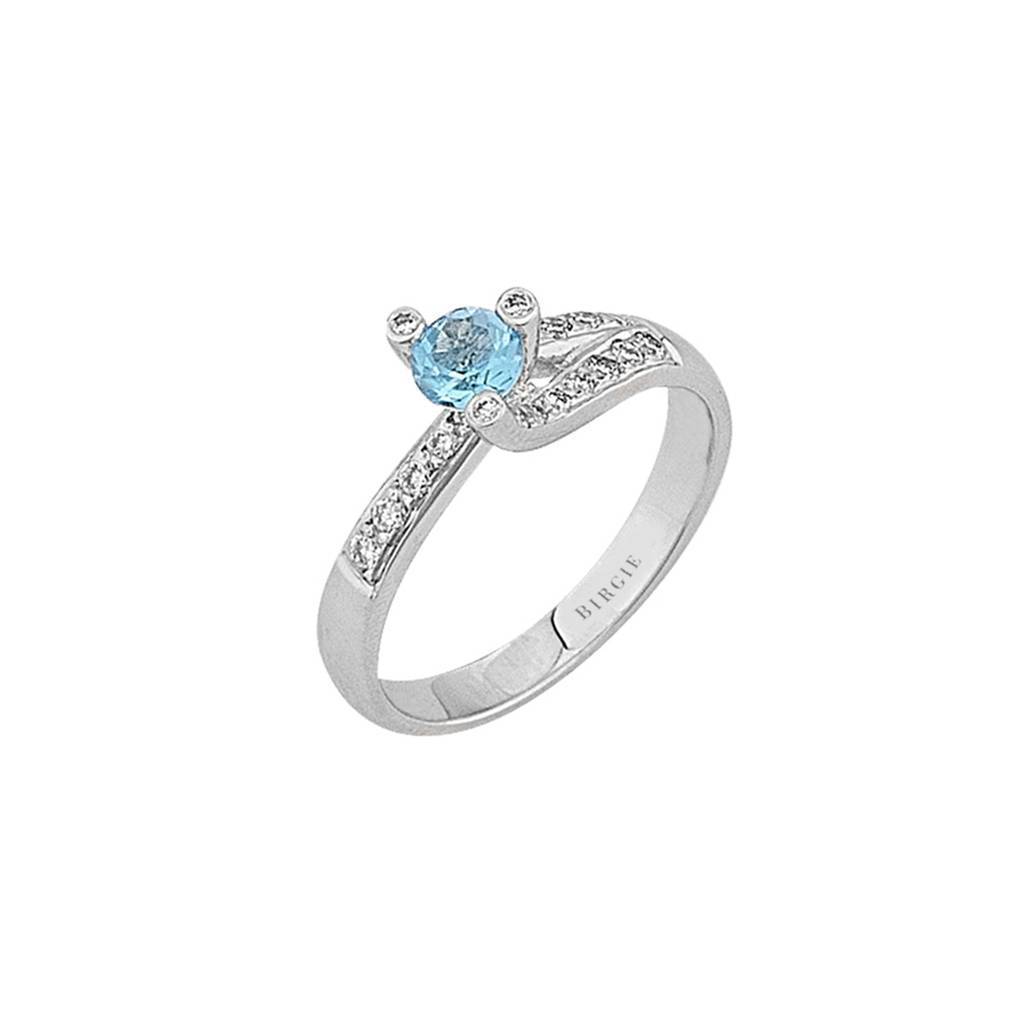 Bague diamant et topaze bleue