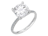 Diamond and White Topaz Ring
