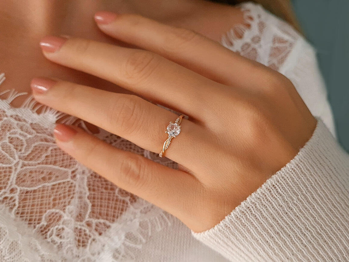 Diamond and White Topaz Ring