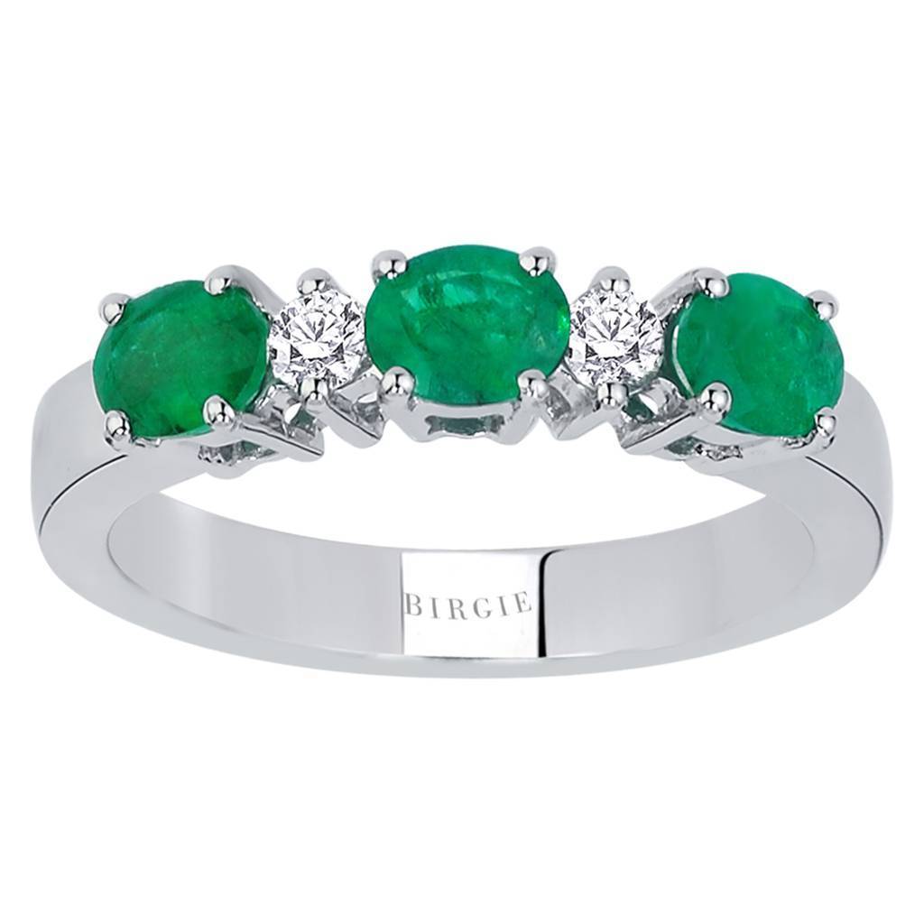 Diamond and Oval Emerald Ring