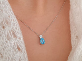 Collier diamant et topaze bleue ovale