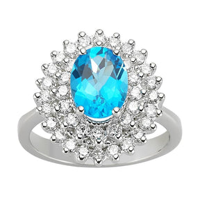 Diamond and Oval Blue Topaz Ring