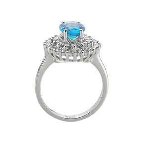 Diamond and Oval Blue Topaz Ring