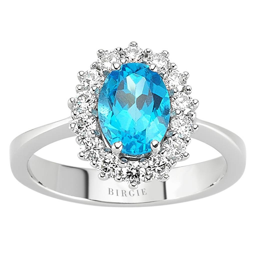 Diamond and Oval Blue Topaz Ring