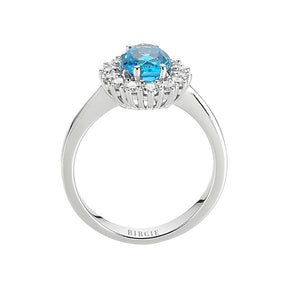 Diamond and Oval Blue Topaz Ring