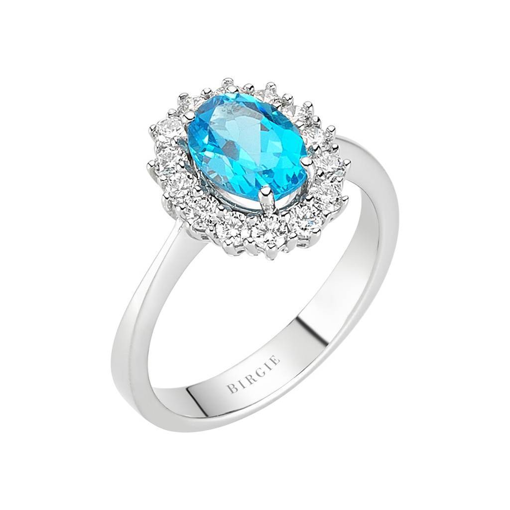 Diamond and Oval Blue Topaz Ring