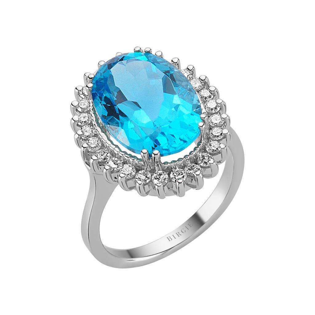 Diamond and Oval Blue Topaz Ring